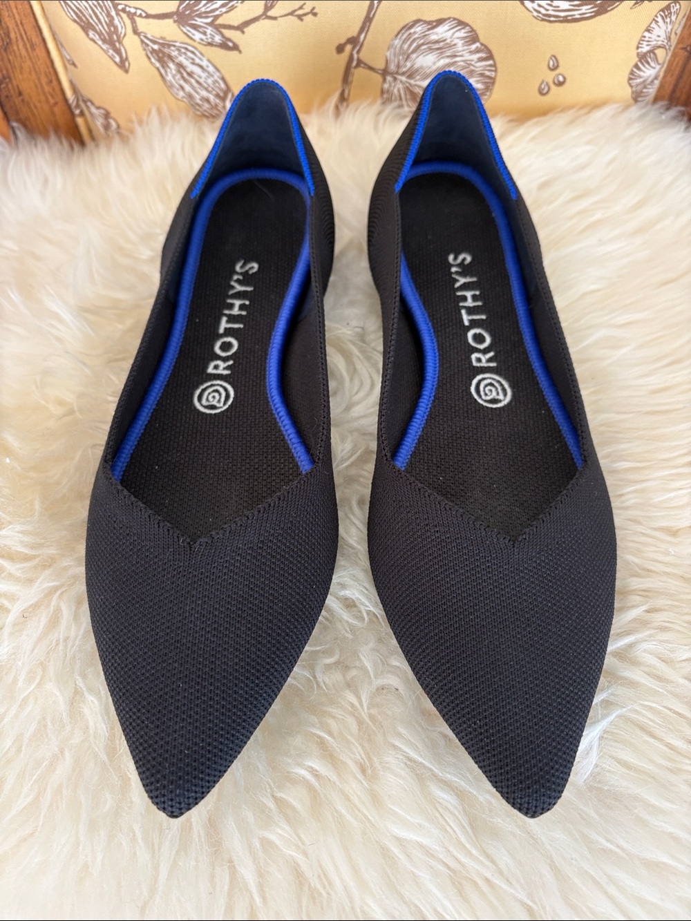 Rothy's Pointed Flats in Black with Blue Trim